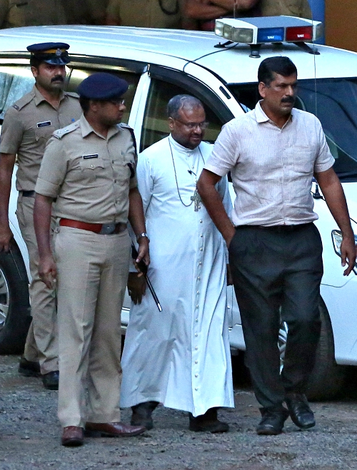 Bishop Franco Mulakkal of Jalandhar, India, is led away for questioning by police Sept. 19, 2018. (CNS/Reuters/Sivaram V)