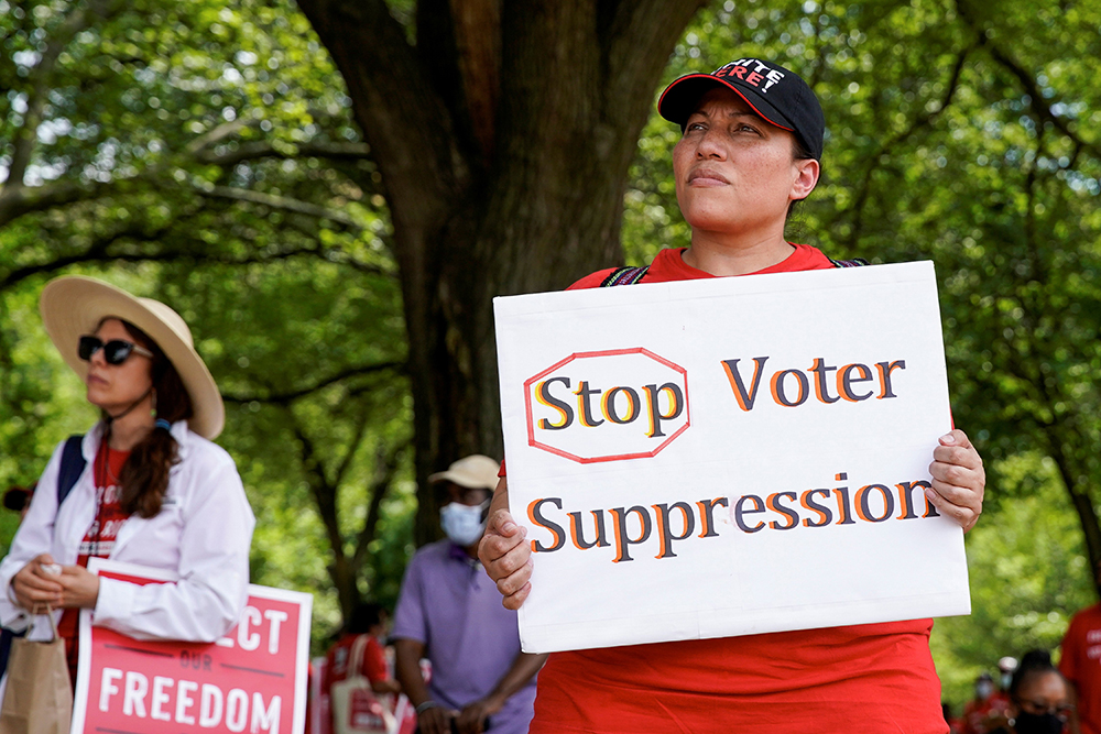 People attend a June 26, 2021, rally in Washington calling for a stop to voter suppression. (CNS/Reuters/Elizabeth Frantz)
