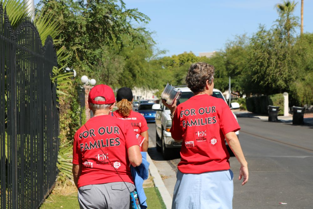 The Nuns on the Bus canvass Las Vegas neighborhoods with members of the Culinary Workers Union Local 226 on Oct. 10. (Network Lobby for Catholic Social Justice / Colleen Ross)