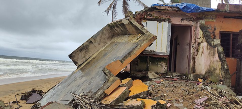 Houses destroyed by sea erosion are seen near the site of an international seaport under construction in the southwestern Indian state of Kerala. (GSR photo/Thomas Scaria)