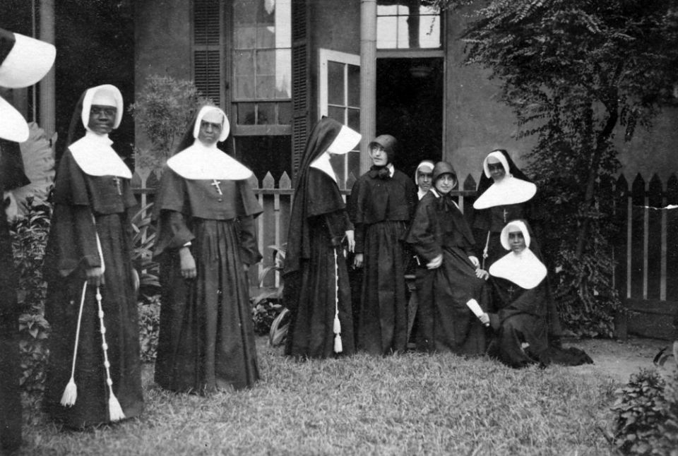Sisters of the Holy Family, in the white-and-black veils, and Sisters of Charity of Seton Hill, in the black caps, in New Orleans in the 1920s. (Courtesy of the Archives of the Sisters of Charity of Seton Hill)