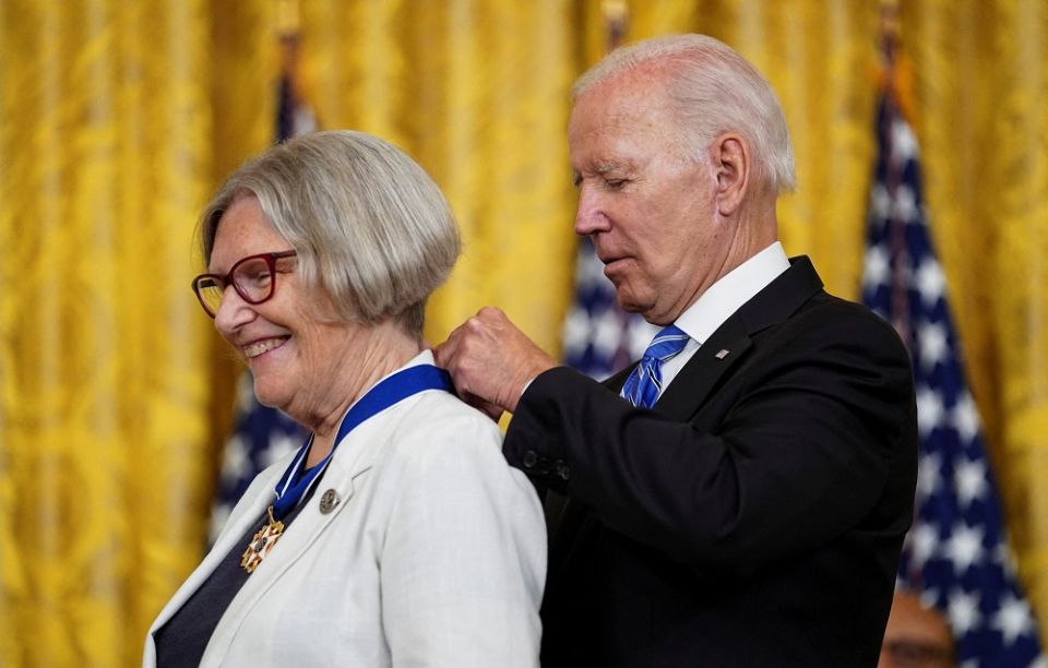 President Joe Biden awards the Presidential Medal of Freedom to Sr. Simone Campbell, a longtime advocate for economic justice and health care policy, during a July 7 ceremony at the White House in Washington. (CNS/Reuters/Kevin Lamarque)