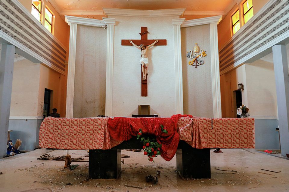 The altar of St. Francis Xavier Church in Owo, Nigeria, on June 5, the day after gunmen attacked worshippers. In August, Nigerian officials identified six suspects arrested in connection with the attack that killed 40 people. (CNS/Reuters/Temilade Adelaja The altar of St. Francis Xavier Church in Owo, Nigeria, on June 5, the day after gunmen attacked worshippers. In August, Nigerian officials identified six suspects arrested in connection with the attack that killed 40 people. (CNS/Reuters/Temilade Adelaja