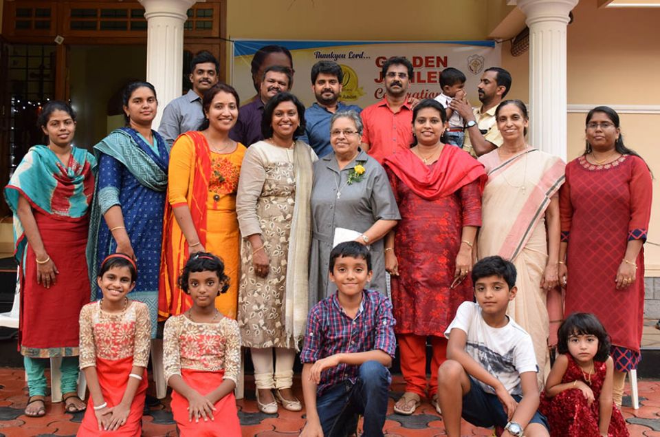 Sister Caridad with nieces and nephews (Courtesy of the Paramundayil family)