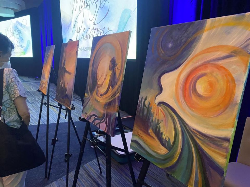 Each day of the assembly, St. Joseph Sr. Celeste Mokrzycki painted her impression of the assembly, an artistic endeavor in line with the theme "Mystical Wisdom: Following Spirit's Beckoning." (Photo by Soli Salgado)