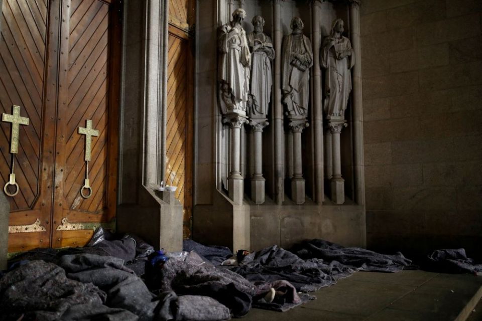 Homeless people sleep in front of the São Paulo Cathedral during cold temperatures in the Brazilian city May 18, 2022.St. Rita Schneider said her religious vocation grew when witnessing the poverty and suffering in rural Brazil.