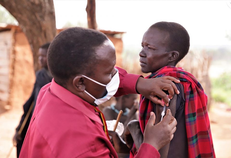 A man receives a COVID-19 vaccine in Karamoja, Uganda, during a February COVID-19 vaccination campaign in rural Uganda. (Courtesy of Catholic Relief Services/Kato Chrysestom)