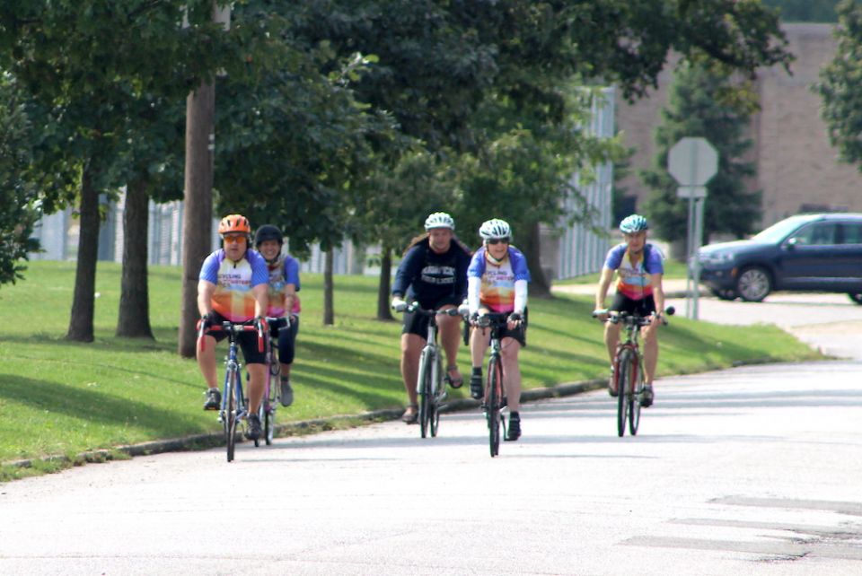 The final five Cycling with Sisters riders arrive at their destination Sept. 11 in South Bend, Indiana, after a 60-mile ride from Chesterton to draw attention to the social justice work of Catholic women religious. (Nick Schafer)