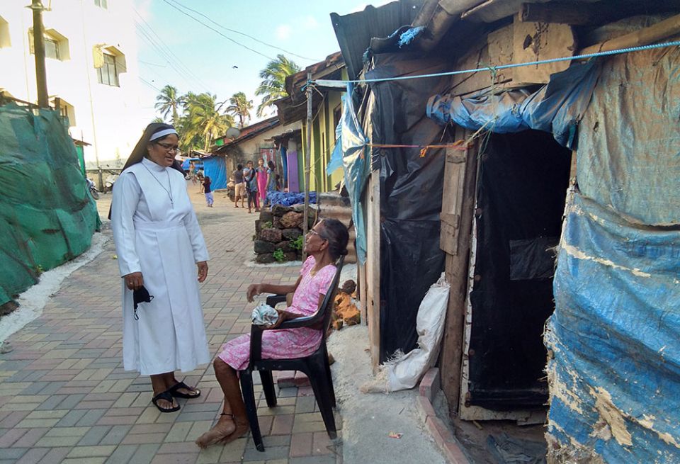 Holy Family of Nazareth Sr. Lourenca Marques visits the settlements at Baina Beach, Goa, western India. (Lissy Maruthanakuzhy)