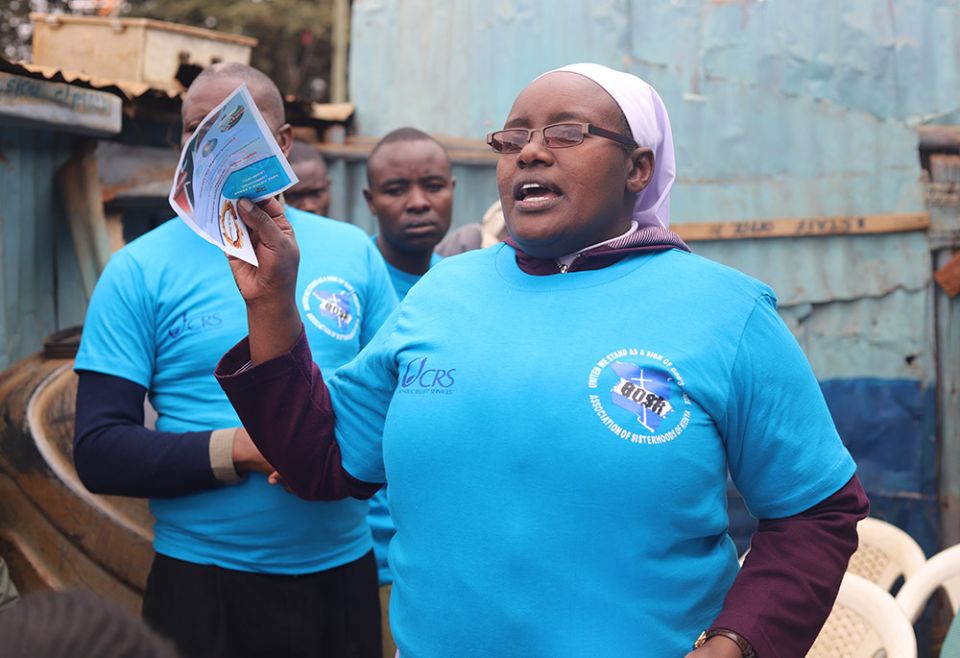 Sr. Virginia Njeri of the Religious of the Assumption talks to residents of Kawangware, a low-income residential area in Nairobi, July 22. The sisters conduct peace campaigns to urge residents to maintain peace and avert violence during elections. (GSR)