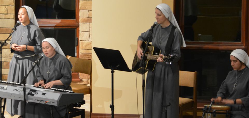 Franciscan Sr. Mary Gemma Harris plays the piano during a musical performance with other Franciscan sisters. (Courtesy of the Franciscan Sisters T.O.R./Caroline Fischer)