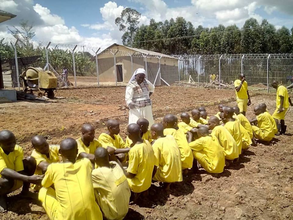 Sr. Mary Grace Akiror counsels prisoners in Sheema District in western Uganda, where she had gone to monitor the progress of prison construction. (Gerald Matembu)