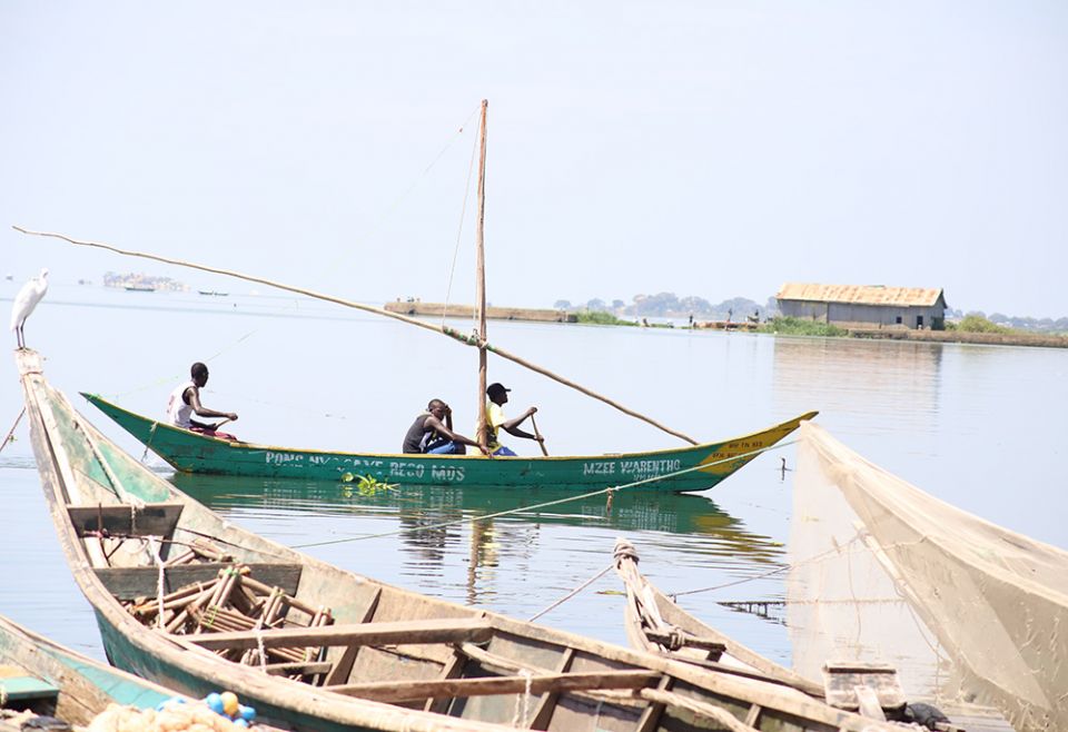 On the shores of Lake Victoria in Kisumu in southwestern Kenya, boats row in and out, some full of fish while others carry fishermen with nets. (GSR photo/Doreen Ajiambo)