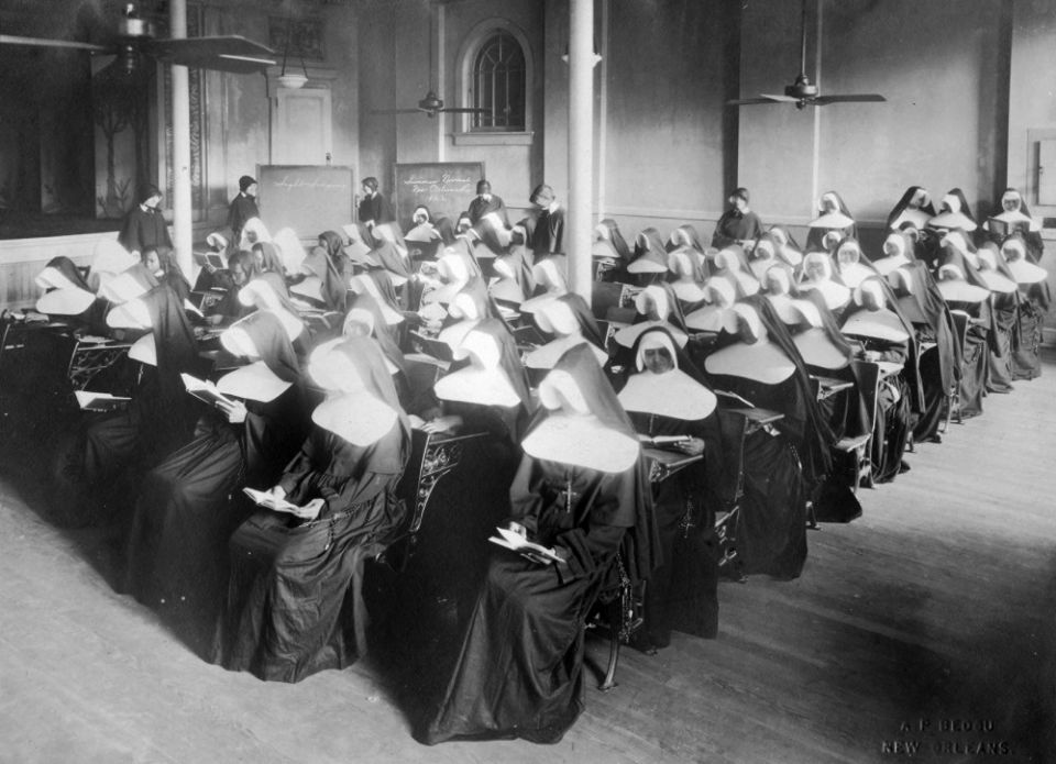 Sisters of Charity of Seton Hill, in black veils in the back, teach Sisters of the Holy Family to prepare them for the Louisiana state teaching exams in the 1920s. (Courtesy of the Archives of the Sisters of Charity of Seton Hill) Sisters of Charity of Seton Hill, in black veils in the back, teach Sisters of the Holy Family to prepare them for the Louisiana state teaching exams in the 1920s. (Courtesy of the Archives of the Sisters of Charity of Seton Hill)