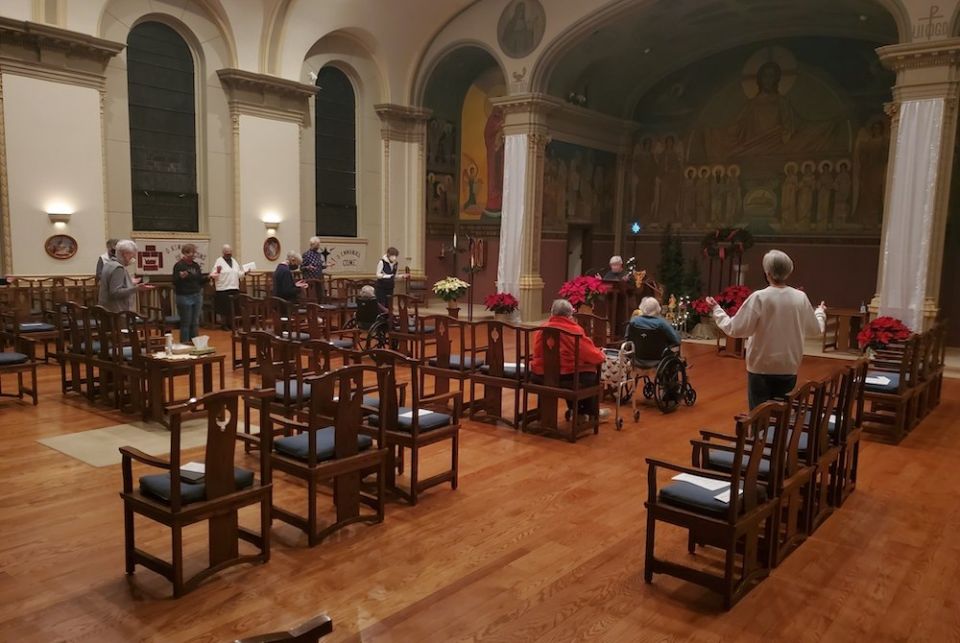 Benedictine Sisters pray Vespers together at St. Scholastica Monastery in Chicago, Illinois, on New Year's Eve, 2020. (Belinda Monahan)