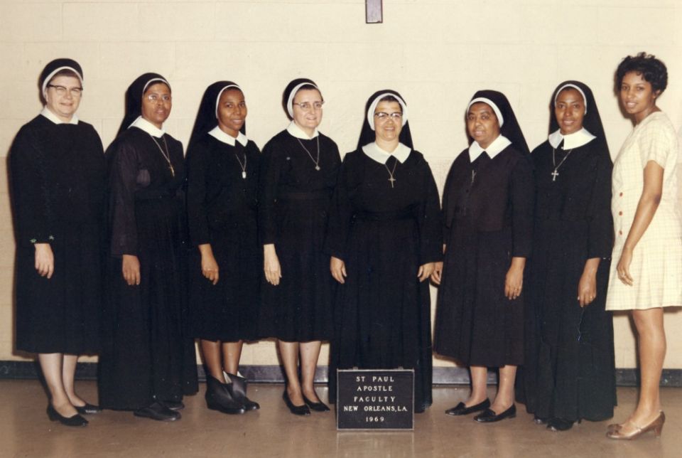 Three Sisters of Charity of Seton Hill pose with Sisters of the Holy Family at the Holy Family school where they taught in New Orleans in 1969.