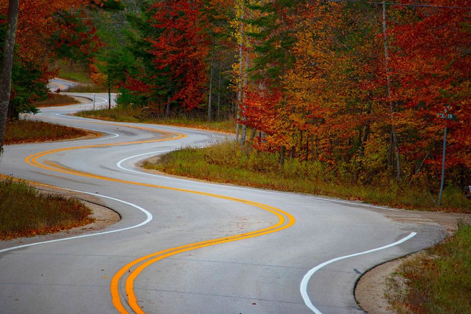 Curving road (Unsplash/Jacob Kiesow)