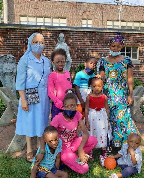 Sr. Alice Thepouthay with Tanzanian members of St. Michael Parish in Milwaukee (Courtesy of Alice Thepouthay)