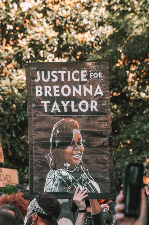 A protester holds up a sign calling for justice for Breonna Taylor at a Black Lives Matter protest in Atlanta. (Photo by Maria Oswalt on Unsplash)