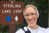 Sr. Kathryn Press stands at a trailhead in New York's Sterling Forest State Park in the Ramapo Mountains (Courtesy of Kathryn Press)