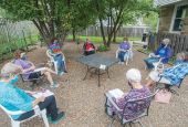 A woman's prayer group offered by Srs. Mary Barbara Wieseler and Elena Mack meets in the backyard of a Sisters of Charity of Leavenworth house in Kansas City, Kansas, during the pandemic. (Sisters of Charity of Leavenworth)