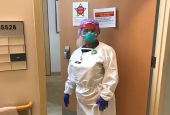 Sr. Vivien Echekwubelu, registered nurse and member of the Sisters of Notre Dame de Namur, in her protective gear on shift at a hospital in Baltimore, Maryland (Provided photo)