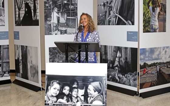 Photographer Lisa Kristine speaks at the July 29, 2019, opening of the "Nuns Healing Hearts" photo exhibition at the United Nations. (CNS/Gregory A. Shemitz)